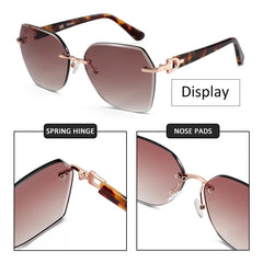 Oversized Rimless Butterfly Sunglasses by Snagg It Sunglasses