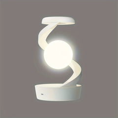 Multifunctional Rotating Floating Lamp by Snagg A Table Lamp