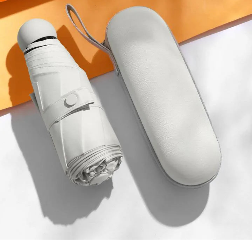 Mini Portable Sun & Rain Protection Umbrella by Snagg An Umbrella