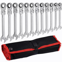 Set of ratchet wrenches with a black and red roll-up tool case on a white background