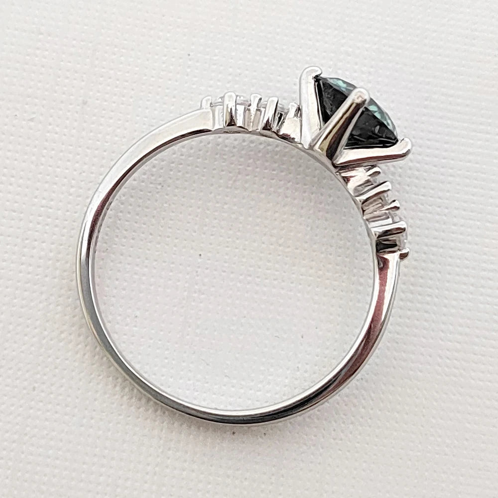 Green Moissanite Ring by Snagg A Ring