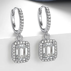 Emerald Cut Moissanite Drop Earrings by Snagg An Earring